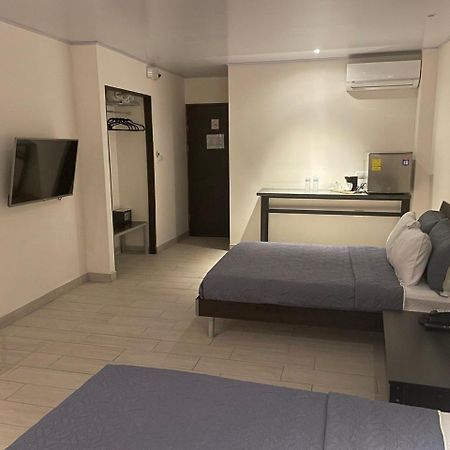 LOP Inn Ciudad Cariari Bagian luar foto