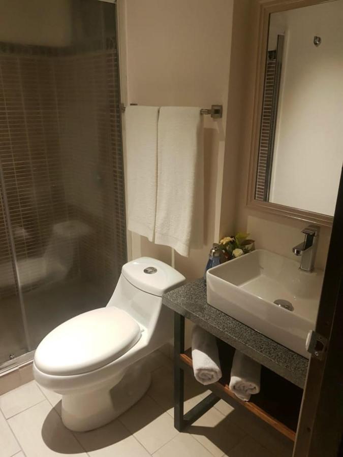 LOP Inn Ciudad Cariari Bagian luar foto
