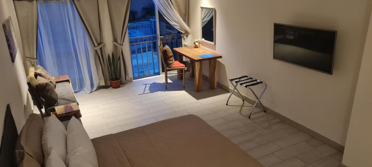 LOP Inn Ciudad Cariari Bagian luar foto