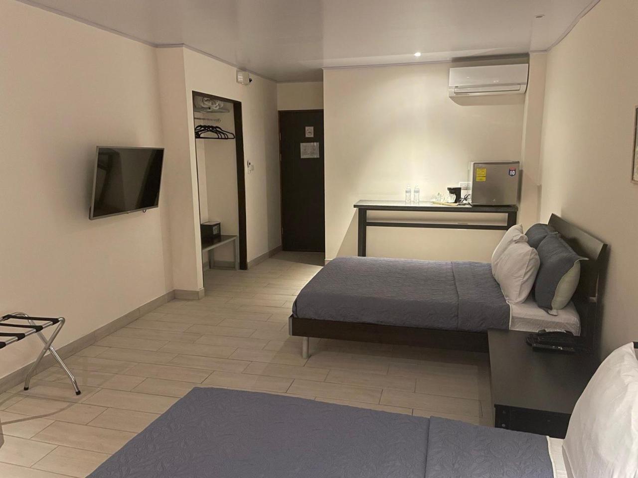 LOP Inn Ciudad Cariari Bagian luar foto